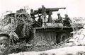 Campagne de Tunisie Février 1943 à Bou Arada - Canon de 75m/m de campagne monté sur pivot tout azimut et plateau de camion